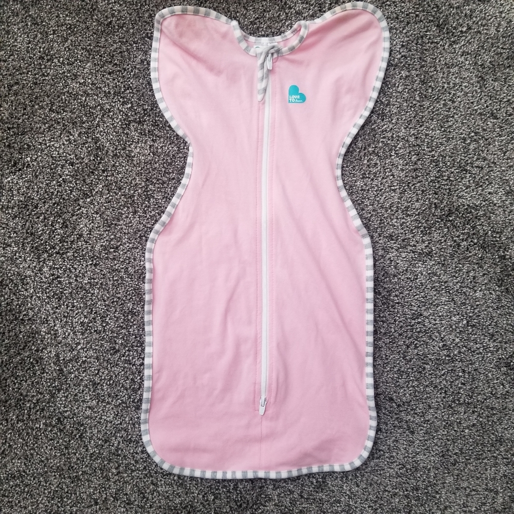 Love to dream swaddle. Only used 2 times because my baby outgrew it